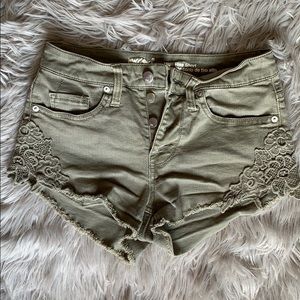 high rise green denim crochet detail